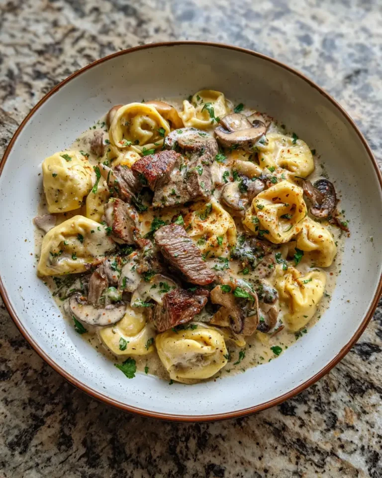 Cracked Garlic Steak Tortellini in Creamhouse Sauce Recipe You Need to Try - Featured Image